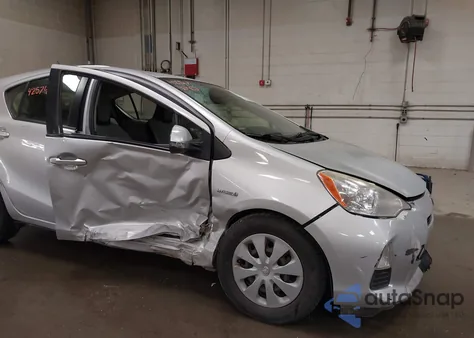 2013 Toyota Prius C One from USA, damaged, VIN JTDKDTB38D1055527